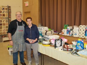 John Hayter and Shirley Gilham stand beside a stockpile of household goods donated for a Syrian refugee family of four coming to Sarnia in the near future. The goods were donated on Mar. 19 at Canon Davis Memorial Church's Refugee Family House Warming event.
CARL HNATYSHYN/SARNIA THIS WEEK