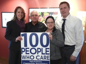 Members of the Elgin St. Thomas Community Foundation board of directors make their pledge to be one of the 100 People Who Care. From left - Kelly Ruddock, Wayne Kentner, Elaine McGregor-Morris, Shawn Jackson.