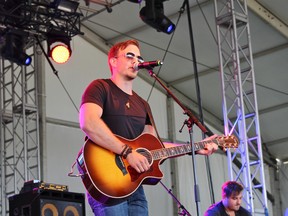 Eric Ethridge competes (with his band) on the Front Porch stage in the Emerging Artist showcase Saturday. The Sarnia-born musician is among six finalists announced Tuesday for the 2016 Canadian Country Music Association Discovery Showcase. (Postmedia Network)