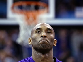Los Angeles Lakers forward Kobe Bryant looks on before the start of an NBA basketball game against the Utah Jazz, Monday, March 28, 2016, in Salt Lake City. (AP Photo/Rick Bowmer)