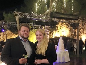 This 2015 family photo shows Alexander Pinczowski and his fiance Cameron Cain in Greece. Alexander and Sascha Pinczowski, Dutch nationals who lived in the U.S., were headed home to the United States when a bomb exploded at the Brussels airport Tuesday morning. Alexander, 29, was on the phone with his mother in the Netherlands when the line went dead, said James Cain, whose daughter Cameron was engaged to Alexander. (Courtesy of the family via AP)