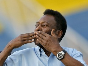 Brazilian soccer legend Pele is suing Samsung, accusing the company of improperly used a look-alike in an ad that ran in the New York Times without permission. (Anindito Mukherjee/Reuters/Files)