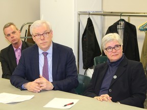 NDP leader Greg Selinger, alongside Riel NDP candidate Christine Melnick, answers questions about the NDP plan to hire more health-care workers on Tuesday. (JOYANNE PURSAGA/Winnipeg Sun)