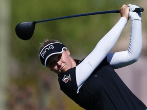 Brooke Henderson tees of on the seventh hole during the final round of the JTBC Founders Cup golf tournament in Scottsdale, Ariz., on March 20, 2016. (AP Photo/Rick Scuteri)