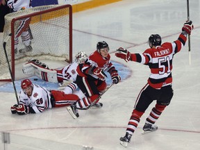 Ottawa 67's forward Artur Tyanulin scores on IceDogs goalie Alex Nedeljkovic during first-period OHL action at the Civic Centre in Ottawa on March 28, 2016. (Tony Caldwell/Postmedia)