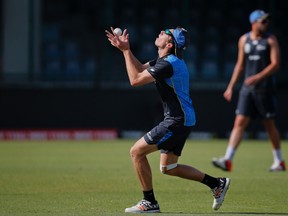 New Zealand’s Mitchell Santner catches a ball during a practice session on March 29, 2016. The spin bowler is expected to be a big part of his team’s ICC Twenty20 2016 Cricket World Cup semifinal match against England on March 30, 2016, in New Delhi, India. (TSERING TOPGYAL/AP)