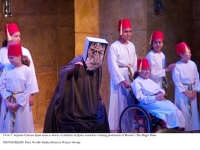 Soprano Clarissa Spata leads a chorus of children in Opera Australia’s touring production of Mozart’s The Magic Flute. Peter Neville-Hadley/Horizon Writers’ Group