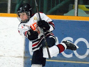 Wallaceburg Atom #2 player Brody Falconer celebrates scoring a goal during a game held Tuesday, March 22, at Wallaceburg Memorial Arena