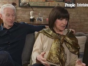 Anderson Cooper looks on in shock as his mother, Gloria, reveals she once had a lesbian relationship during an interview with People magazine. (People.com screen shot)