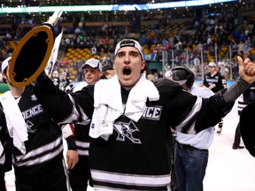 Brandon Tanev celebrates with the trophy after defeating the Boston University Terriers 4-3 in the championship game of the Frozen Four college ice hockey tournament at TD Garden last year. On Wednesday, Tanev signed with the Winnipeg Jets. (Winslow Townson-USA TODAY Sports file photo)