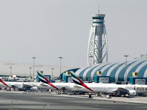 The traffic control tower is seen near the Emirates Terminal at Dubai International Airport, in this file photo taken February 10, 2013. REUTERS/Jumana El Heloueh/Files