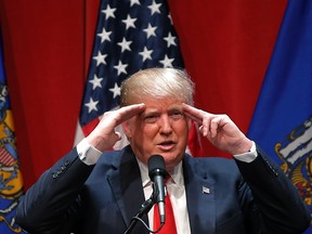 U.S. Republican presidential candidate Donald Trump speaks at a campaign rally in De Pere, Wisconsin, United States, March 30, 2016.    REUTERS/Jim Young