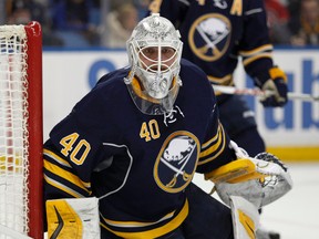 Buffalo Sabres goalie Robin Lehner looks for the puck against the Calgary Flames at First Niagara Center. (Timothy T. Ludwig/USA TODAY Sports)