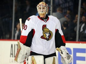 Ottawa Senators goalie Andrew Hammond reacts after allowing a goal to the New York Islanders during second-period NHL action at Barclays Center in Brooklyn on March 23, 2016. (Brad Penner/USA TODAY Sports)