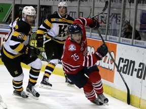 Kingston Frontenacs defenceman Roland McKeown chases Oshawa Generals forward Kenny Huether as Frontenacs defenceman Chad Duchesne looks on during an OHL regular-season game at the Rogers K-Rock Centre in October. (Whig-Standard file photo)