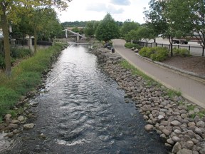 The Fox River flows through downtown Waukesha, Wis., in this photo from 2013. The city?s aquifers are contaminated with cancer-causing radium. (Associated Press file photo)