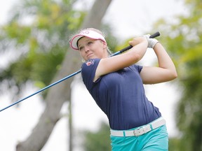 Brooke Henderson tees off during the final round of the HSBC Women’s Champions tournament Sunday, March 6, 2016, in Singapore. (AP Photo/Wong Maye-E)