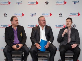 Justin Wismer, of Highland Country Club, left, and Mike Cunneen, of London Life, listen as Adam Helmer, of Golf Canada, announces that the Thames Valley Children?s Centre will return as the charitable beneficiary of the Freedom 55 Financial Championship at Highland in September.  (Derek Ruttan/London Free Press)