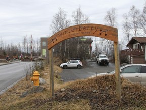 Children play outside Winterberry Charter School in Anchorage, Alaska, Wednesday, March 30, 2016. Three first-graders in Alaska's largest city plotted to kill a fellow student with silica gel packets that the girls believed was poison and have been disciplined but not charged with any crime, authorities said Wednesday. (AP Photo/Mark Thiessen)