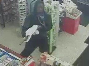 Suspect with a long gun in a Convenience store stickup March 12. Ottawa Police handout.