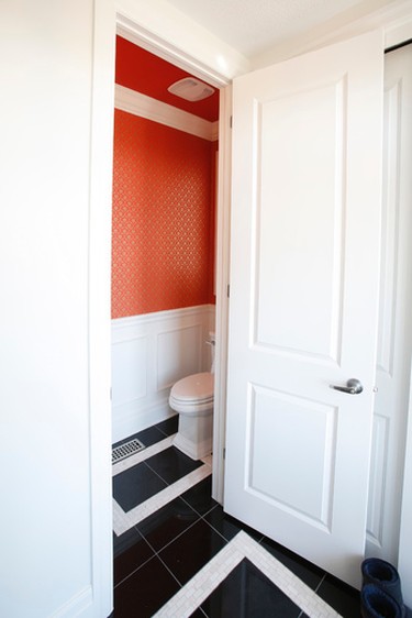 Choose a fun or dramatic wallpaper

Wallpapering a large space can be a daunting prospect and choosing a pattern that won't overwhelm or date quickly is tricky. The powder room is the perfect opportunity to choose something bright and bold. If you get bored of it, it's easy to replace and as a self-contained room, you don't have to worry about it matching the rest of your home. Go wild!  

 Glenview Homes