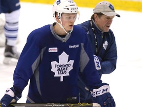 Maple Leafs coach Mike Babcock guides Kasperi Kapanen during practice at the MasterCard Centre in Toronto March 1, 2016. (Craig Robertson/Toronto Sun)
