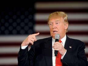 Republican U.S. presidential candidate Donald Trump speaks at a town hall event in Appleton, Wisconsin, March 30, 2016. REUTERS/Mark Kauzlarich