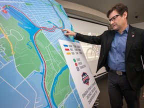 Christian Triquet of Triathlon Canada checks out the route as the City of Ottawa and Ottawa Tourism join forces with Triathlon Canada to announce that the National Capital Region will host the Ottawa Triathlon for 2016 and 2017. (Wayne Cuddington/Postmedia)
