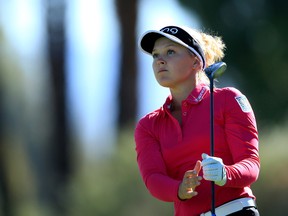 Brooke Henderson watches a shot during the opening round of the ANA Inspiration at Mission Hills Country Club in Rancho Mirage, Calif., on March 31, 2016. (AFP)