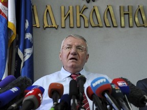 Serbian nationalist leader Vojislav Seselj speaks during a news conference in his Radical party headquarters in Belgrade, Serbia, March 31, 2016. U.N. judges acquitted Serbian nationalist firebrand Seselj of war crimes and crimes against humanity on Thursday, a shock verdict that delivered a boost to his anti-EU Serbian Radical Party ahead of April elections. REUTERS/Stringer