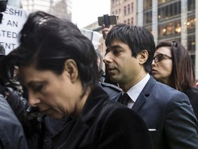 Former Canadian radio host Jian Ghomeshi arrives court with his attorney Marie Henein (L) in Toronto on March 24, 2016. A judge found him not guilty on four sexual assault charges and one count of choking. REUTERS/Jenna Marie Wakani
