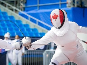 Leonora Mackinnon, right, of Cutting Edge Fencing competes in women’s epee at the 2015 Pan Am Games in Toronto. (Devin Manky Photography)