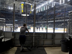 Knights forward Matthew Tkachuk watches an optional practice at Budweiser Gardens before heading back to the dressing room for some bike work in London on Thursday. Mike Hensen/The London Free Press/Postmedia Network