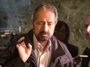 Local Unifor 1688 President Amrik Singh of the taxi union angrily storms out of the council chambers as the city of Ottawa releases it's proposal to change taxi regulations that will include the existence of Private Transportation Companies like Uber. Wayne Cuddington/Postmedia