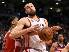 Raptors' Jonas Valenciunas and Grizzlies' Zach Randolph will go head-to-head on Friday in Memphis. (USA TODAY SPORTS/PHOTO)