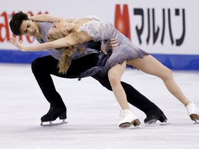 Kaitlyn Weaver and Andrew Poje of Canada compete during the World Figure Skating Championships at TD Garden in Boston on March 31, 2016. (REUTERS/Brian Snyder)