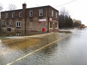 Water is seen over Highway 6 in Williamsford on April 1. (James Masters The Sun Times)