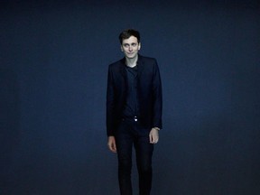 French designer Hedi Slimane appears at the end of his Spring/Summer 2013 women's ready-to-wear fashion show for French fashion house Saint Laurent Paris during Paris fashion week in this October 1, 2012 file photo. Hedi Slimane is stepping down as creative director of fashion brand Yves Saint Laurent after four years on the job, luxury goods company Kering said on Friday April 1, 2016.  Picture taken October 1, 2012. (REUTERS/Gonzalo Fuentes/Files)