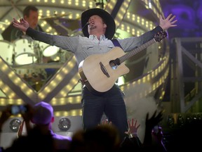 Garth Brooks hits the stage at the Canadian Tire Centre on Friday night, April 1, 2016.