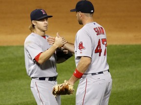 Red Sox's Brock Holt (left) and Travis Shaw have both earned opening day starting roles over players earning a lot more money than they are. (Charles Rex Arbogast, AP)