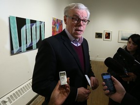Premier Greg Selinger speaks with media after the NDP made an arts announcement at PLATFORM centre for photographic and digital arts gallery in the Artspace Building on Arthur Street in Winnipeg on Sat, April 2, 2016. Kevin King/Winnipeg Sun/Postmedia Network