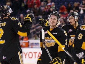 Brandon Wheat Kings' Mitch Wheaton, left, Tyler Coulter, Ivan Provorov and Linden McCorrister celebrate winning 5-0 during Game 4 of their WHL playoff series against the Edmonton Oil Kings Thursday at Rexall Place. (Ian Kucerak)