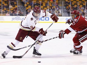 Boston College Eagles star and Senators prospect Colin White (left) works the puck against Harvard’s Brayden Jaw earlier this season. (AFP)