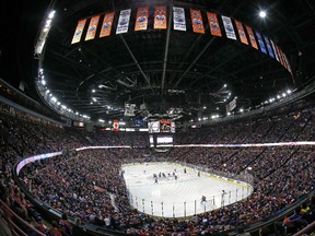 The opening face-off for the last "Battle of Alberta" between the Edmonton Oilers and Calgary Flames at Rexall Place. Mandatory Credit: Perry Nelson-USA TODAY Sports