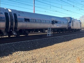 A damaged window is seen on an Amtrak passenger train near Chester, Pennsylvania, in this social media picture from Glenn Hills Jr taken April 3, 2016.  REUTERS/Glenn Hills Jr via social media