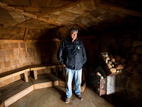 Bob Antone, the executive director of Kiikeewanniikaan, a family-based healing lodge in Muncey, stands in the sweat lodge of the centre. Mike Hensen/The London Free Press/Postmedia Network