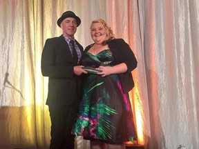 Chelsea Hertzog receives her honour from Ace Burpee at the 2015 Our Manitoba Heroes gala, “a celebration of Manitoba's everyday people doing extraordinary things.”