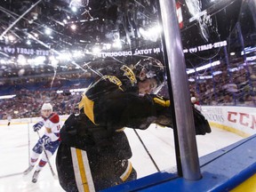 Brandon Wheat King's Nolan Patrick battles along the boards on the way to a 5-2 win over the Edmonton Oil Kings at Rexall Place on Sunday, April 3, 2016. (Ian Kucerak)