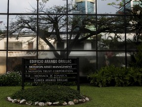 A company list showing the Mossack Fonseca law firm is pictured on a sign at the Arango Orillac Building in Panama City April 3, 2016. REUTERS/Carlos Jasso