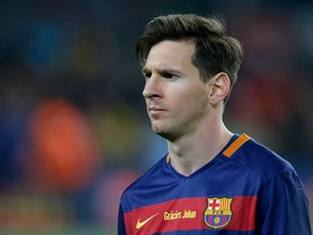Barcelona's Lionel Messi leaves the pitch at the end of a Spanish La Liga soccer match between Barcelona and Real Madrid, dubbed 'el clasico', at the Camp Nou stadium in Barcelona, Spain, Saturday, April 2, 2016. (AP Photo/Manu Fernandez)